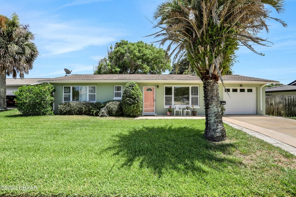 This two-bedroom, two-bath, one-car-garage Ormond Beach home is steps to the river and ocean.