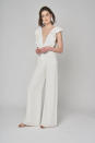 <p>White ruffle jumpsuit. (Photo: Courtesy of Alexandra Grecco) </p>