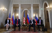 <p>U.S. President Donald Trump, second from left, listens to a statement of Russian President Vladimir Putin, second from right, at the beginning of a meeting at the Presidential Palace in Helsinki, Finland, July 16, 2018. (Photo: Pablo Martinez Monsivais/AP) </p>