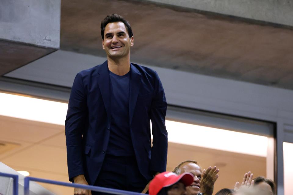 Tennis great Roger Federer acknowledges the crowd during the quarterfinal match between Aryna Sabalenka, of Belarus, and Zheng Qinwen, of China, during the U.S. Open tennis championships, Tuesday, Sept. 3, 2024, in New York. (AP Photo/Adam Hunger) (AP)