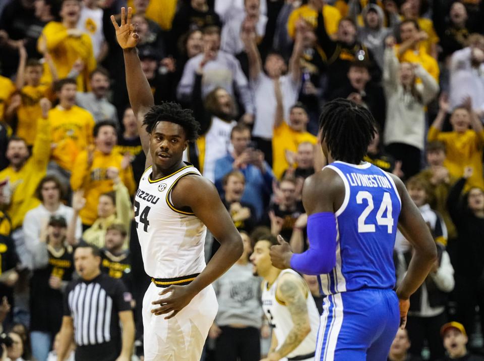 Dec 28, 2022; Columbia, Missouri, USA; Missouri Tigers guard Kobe Brown (24) celebrates after scoring against Kentucky Wildcats forward Chris Livingston (24) during the first half at Mizzou Arena. Mandatory Credit: Jay Biggerstaff-USA TODAY Sports