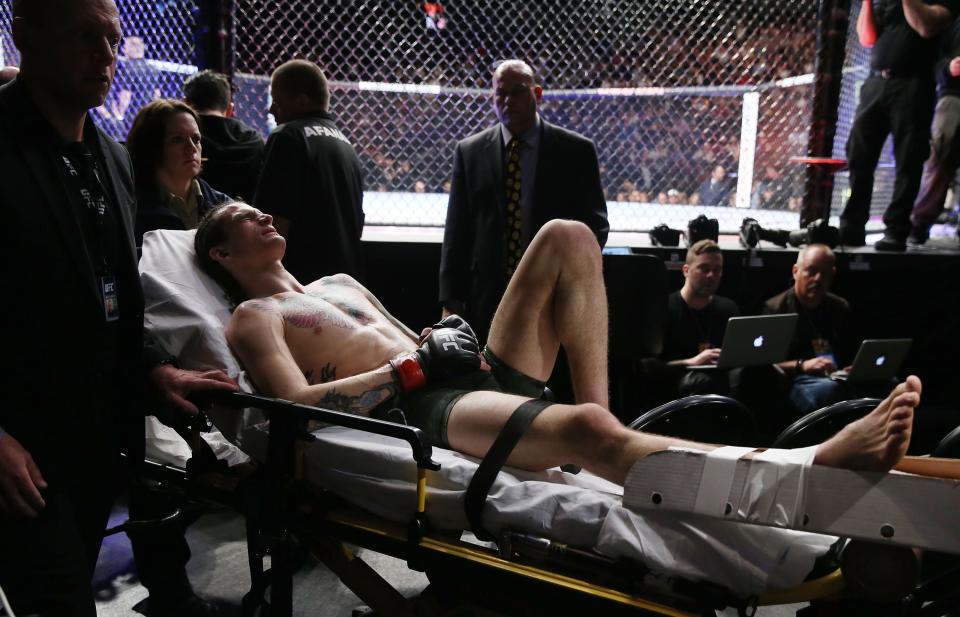 Sean O’Malley leaves the arena on a stretcher after injuring his lower right leg during a bantamweight bout against Andre Soukhamthath during UFC 222 at T-Mobile Arena on March 3, 2018 in Las Vegas, Nevada. (Getty Images)