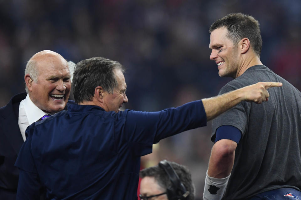 Feb 5, 2017; Houston, TX, USA; New England Patriots quarterback Tom Brady (12) celebrates with head coach Bill Belichick and Terry Bradshaw after the win over Atlanta Falcons during Super Bowl LI at NRG Stadium. The Patriots won 34-28. Mandatory Credit: Bob Donnan-USA TODAY Sports