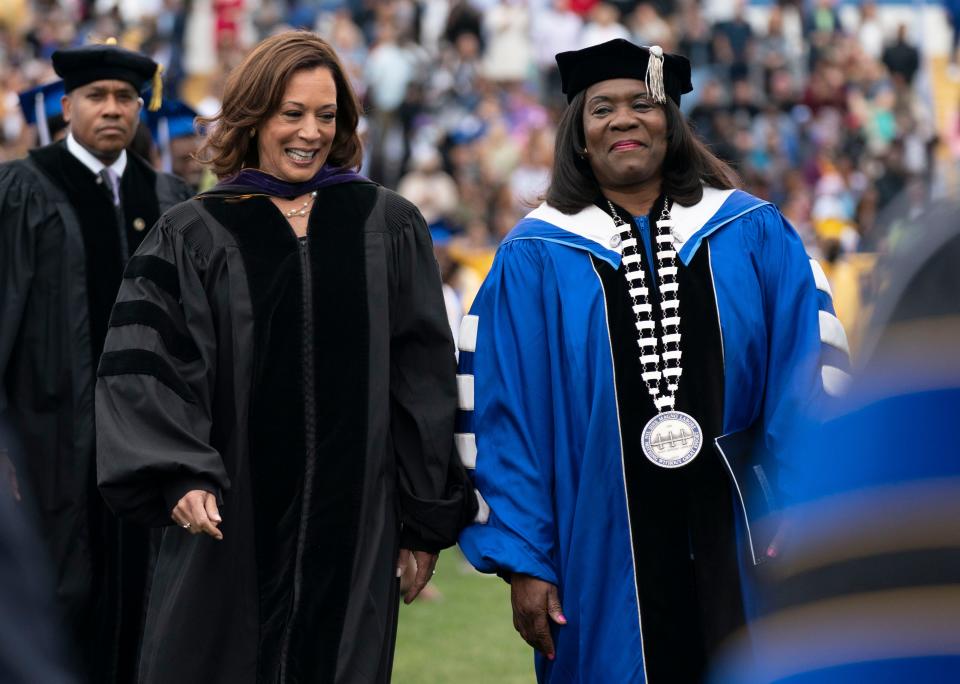 Vice President Kamala Harris arrives with Tennessee State University President Glenda Glover to the commencement ceremony Saturday, May 7, 2022, in Nashville, Tenn. Glover announced in Aug. 14, 2023 that she was retiring.