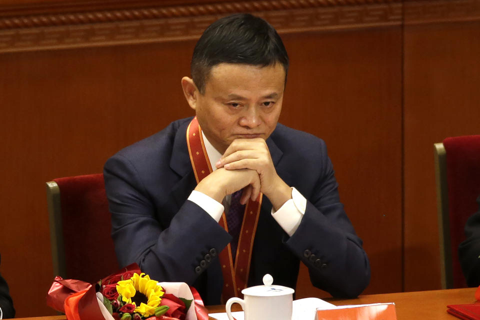 Jack Ma, founder of Chinese e-commerce firm Alibaba Group, attends a conference to commemorate the 40th anniversary of China's Reform and Opening Up policy at the Great Hall of the People in Beijing, Tuesday, Dec. 18, 2018. Ma hasn't been seen since he angered regulators with an October 2020 speech. That is prompting speculation about what might happen to the billionaire founder of the world's biggest e-commerce company. (AP Photo/Mark Schiefelbein)