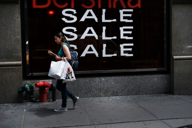 Forecast-beating US retail sales data helped to temper worries about the world's number one economy (SPENCER PLATT)