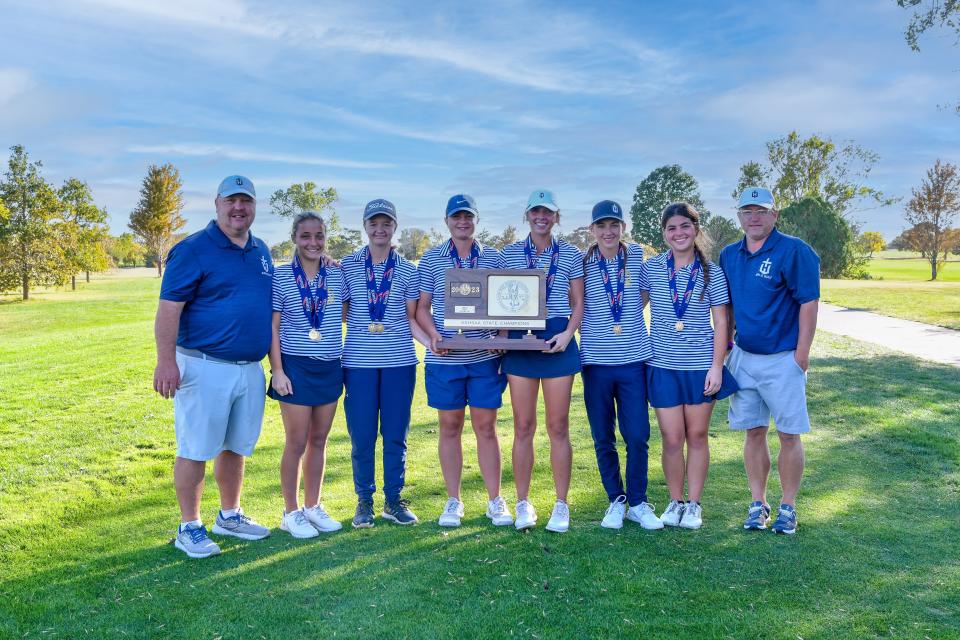 Hayden Catholic poses with the Class 4A State Championship trophy on Tuesday, Oct. 17.