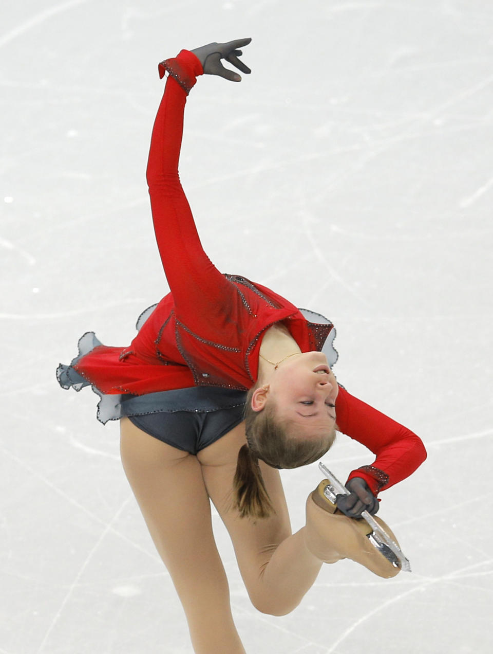 Julia Lipnitskaia of Russia competes in the women's team free skate figure skating competition at the Iceberg Skating Palace during the 2014 Winter Olympics, Sunday, Feb. 9, 2014, in Sochi, Russia. (AP Photo/Vadim Ghirda)