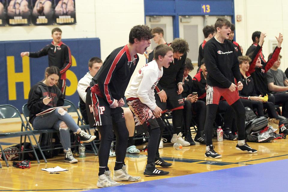 The White Pigeon Chiefs react following a pinfall win from Drew Johnson at 126 pounds on Wednesday.