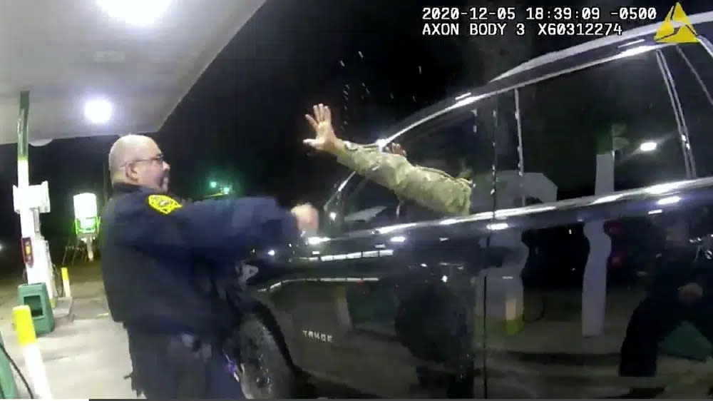 In this image taken from a Windsor, Va., Police video, a police officer uses a spray agent on Caron Nazario, an Army lieutenant who is Black and Latino, on Dec. 20, 2020, in Windsor, Va. (Windsor Police via AP, File)