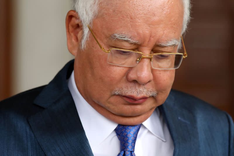 Former Malaysia's Prime Minister Najib Razak leaves Kuala Lumpur High Court in Kuala Lumpur