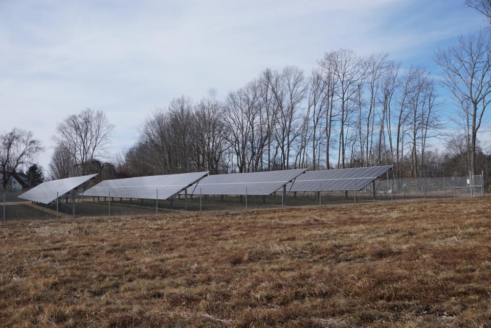 A solar farm off Seven Mile Road in Cranston. Environmentalists are pushing to rethink how Rhode Island locates solar installations, siting them on rehabilitated landfills, gravel pits and industrial land instead of sacrificing green space.