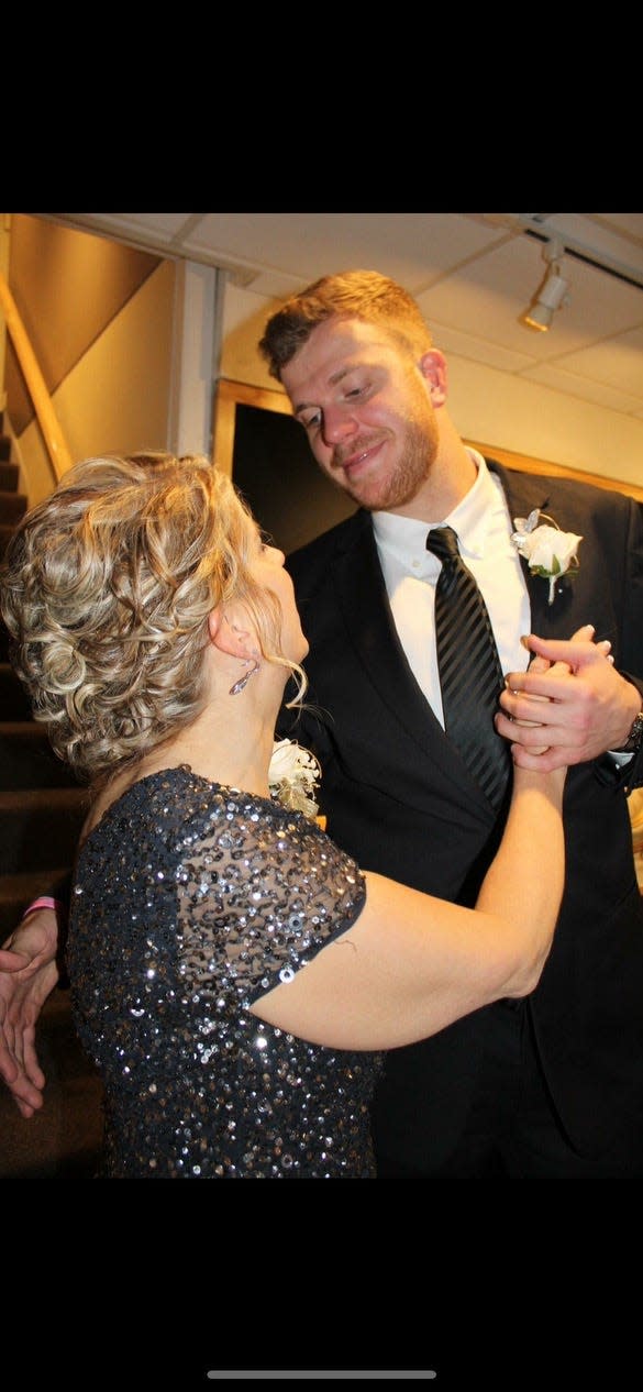 Brett DeGagne dancing with his mother LoAnn, a breast cancer survivor.