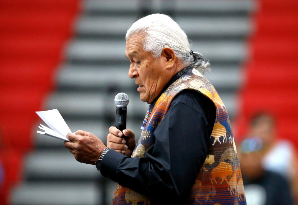 Ray Doyah speaks on July 9, 2022, about his time in a boarding school during a gathering at the Riverside Indian School in Anadarko. Interior Secretary Deb Haaland and Assistant Secretary for Indian Affairs Bryan Newland traveled to Oklahoma as the first stop on a U.S. listening tour to hear from students who attended Native American boarding schools.