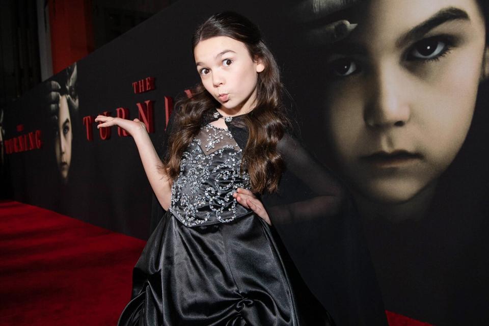 Brooklynn Prince strikes an adorable pose at the premiere of her movie <i>The Turning</i> at TCL Chinese Theatre on Tuesday in Hollywood.