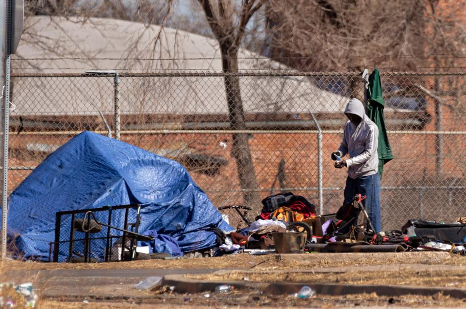 In this March 3 photo, a person is seen at a homeless encampment in downtown Oklahoma City.