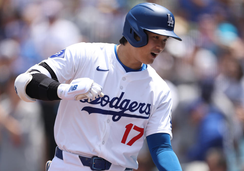 LOS ANGELES, CALIFORNIA - MAY 05: Shohei Ohtani #17 of the Los Angeles Dodgers reacts to his two run home run during the first inning against the Atlanta Braves at Dodger Stadium on May 05, 2024 in Los Angeles, California. (Photo by Harry How/Getty Images)