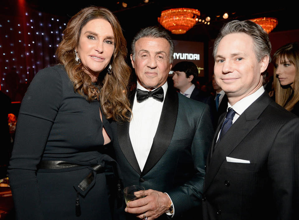 BEVERLY HILLS, CA - FEBRUARY 14: (L-R) TV personality Caitlin Jenner, actor Sylvester Stallone and DuJour CEO Jason Binn attend the 2016 Pre-GRAMMY Gala and Salute to Industry Icons honoring Irving Azoff at The Beverly Hilton Hotel on February 14, 2016 in Beverly Hills, California.  (Photo by Michael Kovac/WireImage)