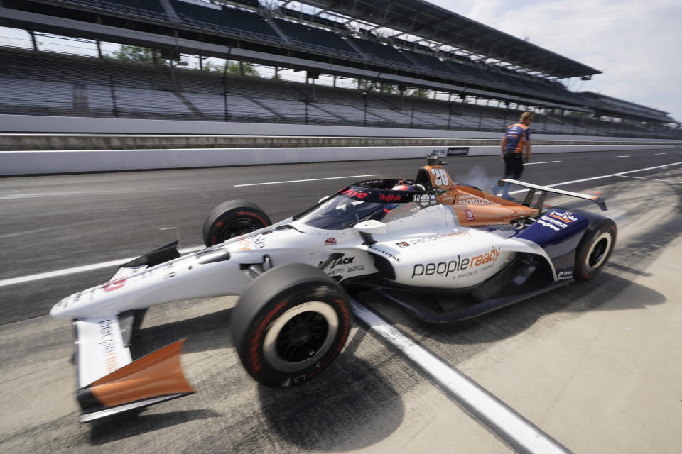 Christian Lundgaard, of Denmark, leaves the pits during practice for the Indianapolis 500 auto race at Indianapolis Motor Speedway, Tuesday, May 17, 2022, in Indianapolis. (AP Photo/Darron Cummings)