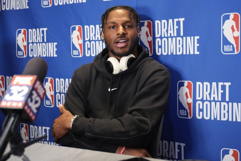 Bronny James talks to media during the 2024 NBA basketball Draft Combine.