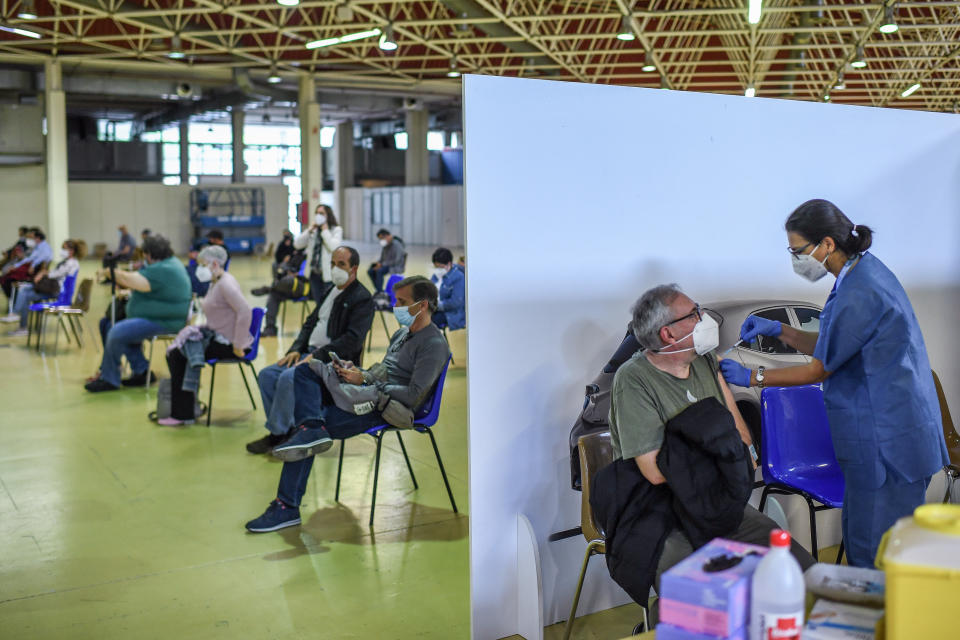 A man is inoculated with the Pfizer-BioNTech Covid-19 vaccine in a vaccination center in La Fira de CornellÃ  del Llobregat on May 14, 2021 in Barcelona, Spain. (David Ramos/Getty Images)