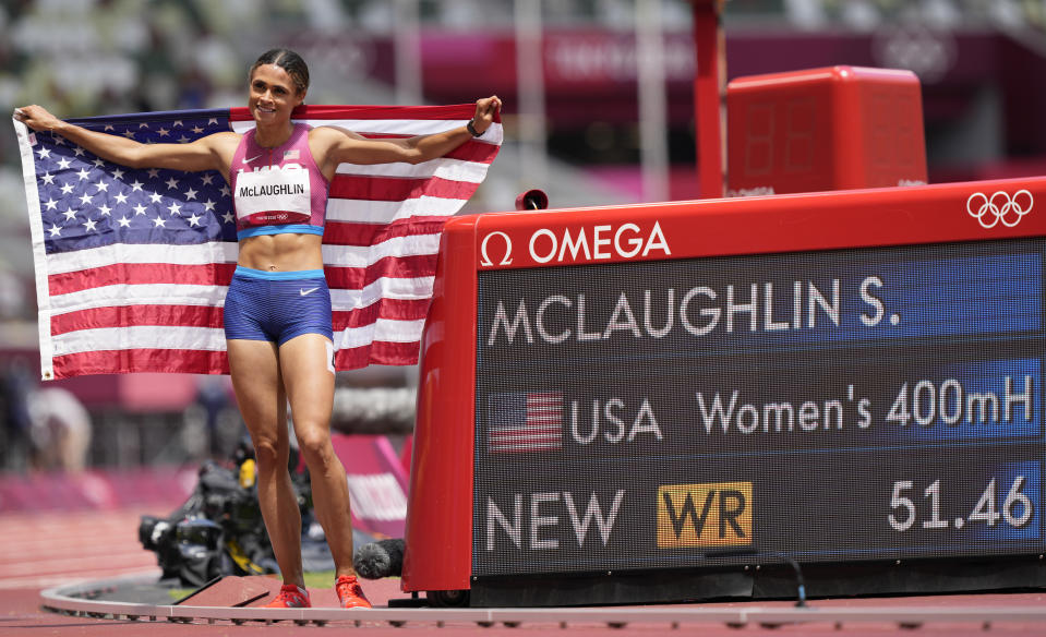 Sydney McLaughlin, of United States celebrates after winning the gold medal in the final of the the women's 400-meter hurdles at the 2020 Summer Olympics, Wednesday, Aug. 4, 2021, in Tokyo, Japan. (AP Photo/Martin Meissner)