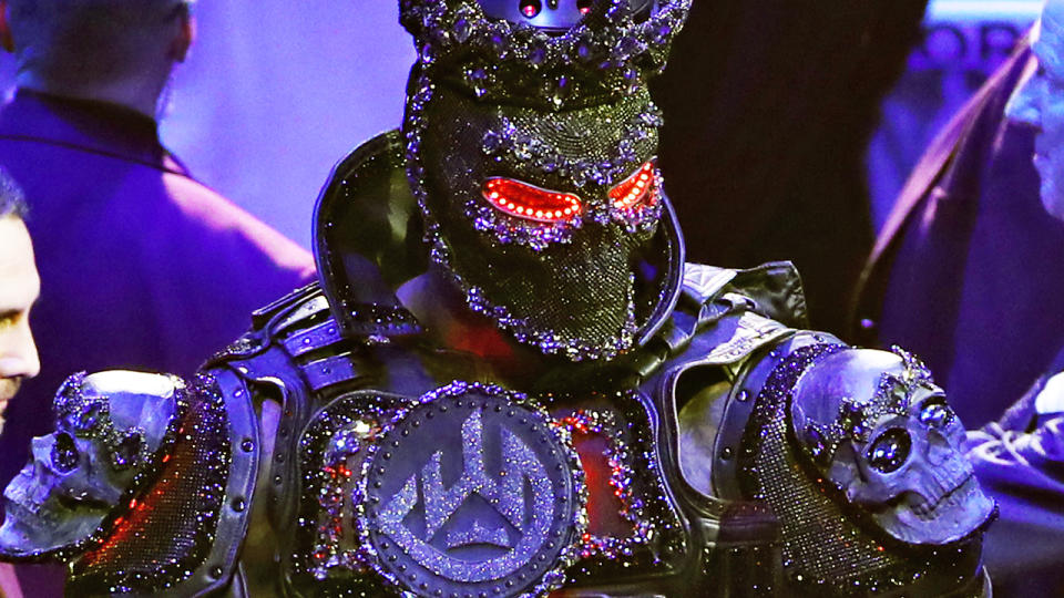 Deontay Wilder pictured arriving in a 20-kilogram costume, has blamed the weight of his outfit for his loss to Tyson Fury.