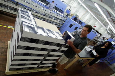 Workers prepare for delivery printed President Donald Trump's FY2018 budget at the Government Publishing Office in Washington, U.S., May 19, 2017. REUTERS/Yuri Gripas