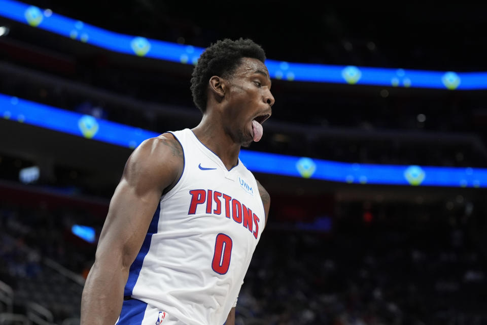 Detroit Pistons center Jalen Duren (0) reacts after a dunk during the first half of an NBA basketball game against the Oklahoma City Thunder, Sunday, Jan. 28, 2024, in Detroit. (AP Photo/Carlos Osorio)
