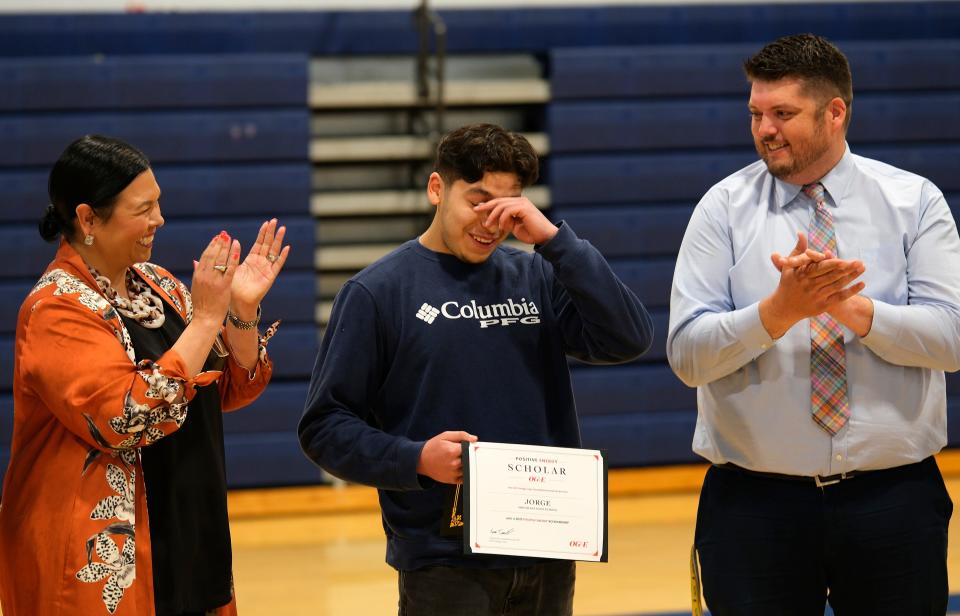 Jorge Merino reacts to as he is told about the Positive Energy Scholar award. The scholarship, provided by OGE Energy Corp. Foundation, will provide $60,000 over the course of four years to help cover tuition, books, fees and on-campus room and board.