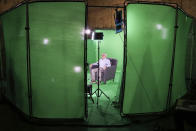 This August 2018 photo shows Holocaust survivor Max Glauben sitting in an interactive green screen room while filming a piece for the Dallas Holocaust Museum in Dallas. Glauben will be the latest to have his story recorded in such a way that generations to come will be able to ask his image questions. Glauben, who turns 91 on Monday, had lost his mother, father and brother at the hands of the Nazis when U.S. troops rescued him while he was on a death march. (McGuire Boles/Dallas Holocaust Museum via AP)