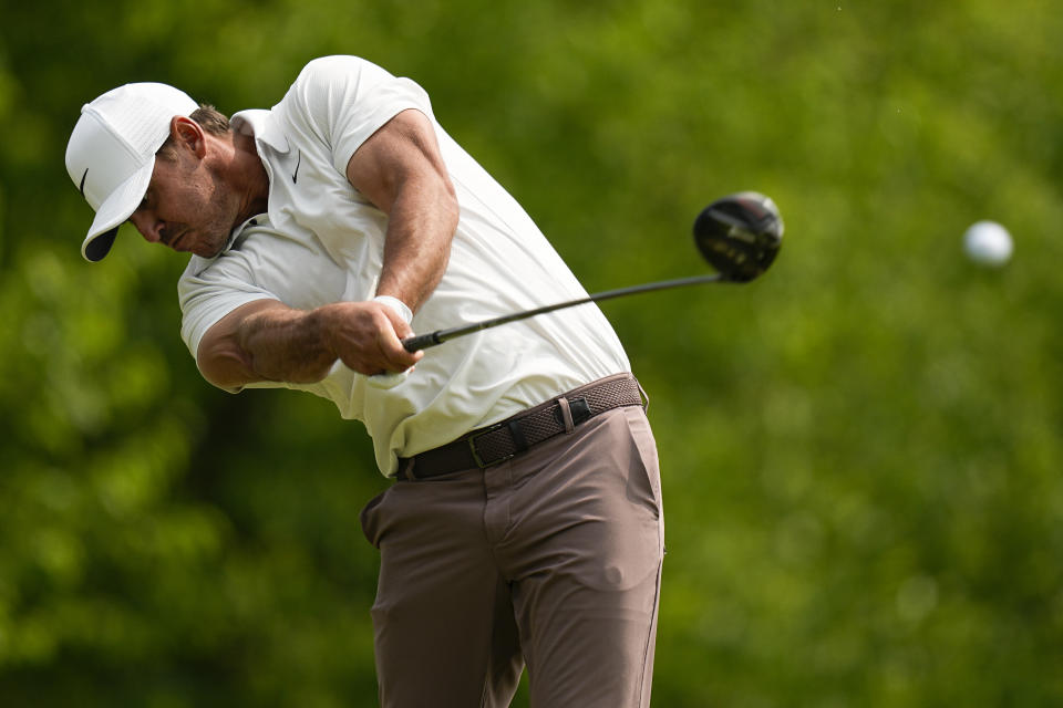 Brooks Koepka hits his tee shot on the fourth hole during the final round of the PGA Championship golf tournament at Oak Hill Country Club on Sunday, May 21, 2023, in Pittsford, N.Y. (AP Photo/Eric Gay)