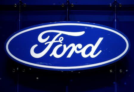 FILE PHOTO: The Ford logo is pictured on the company's stand during the 88th Geneva International Motor Show in Geneva, Switzerland, March 7, 2018. REUTERS/Denis Balibouse