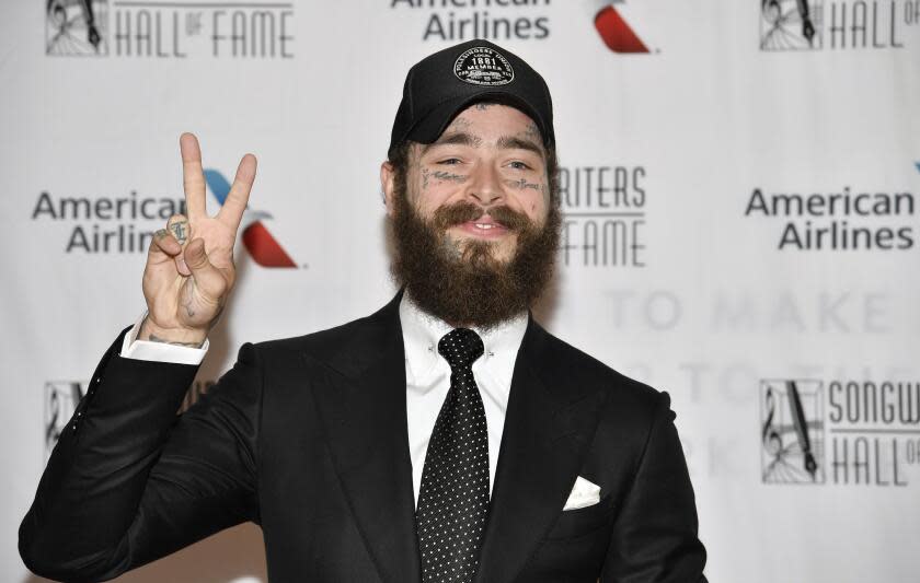The Hal David Starlight Award recipient Post Malone arrives at the 52nd annual Songwriters Hall of Fame induction and awards ceremony at the New York Marriott Marquis Hotel on Thursday, June 15, 2023, in New York. (Photo by Evan Agostini/Invision/AP)