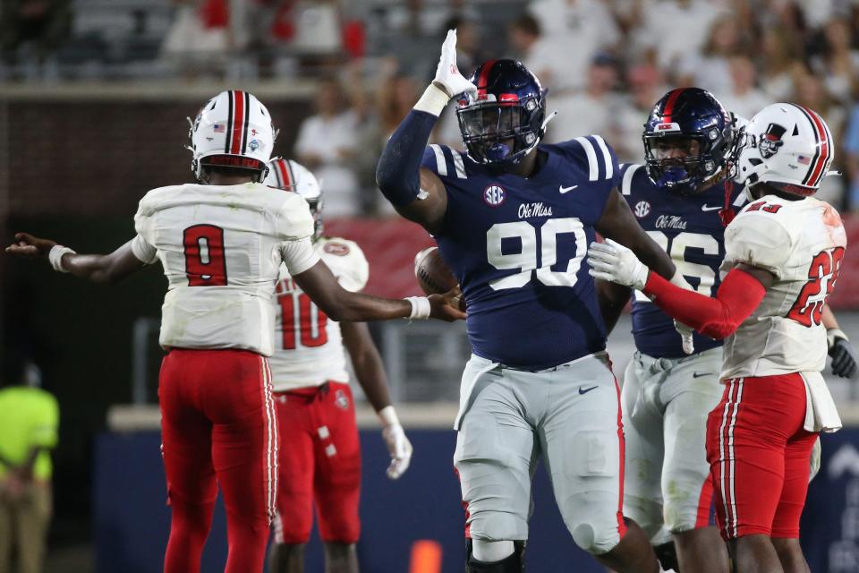 Sep 11, 2021; Oxford, Mississippi, USA; Mississippi Rebels defensive linemen Tywone Malone (90) reacts after sacking Austin Peay Governors quarterback Draylen Ellis (9) during the forth quarter at Vaught-Hemingway Stadium. Mandatory Credit: Petre Thomas-USA TODAY Sports