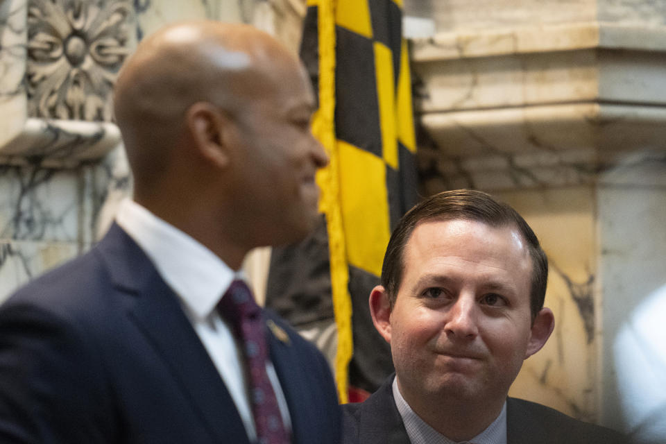 Maryland Senate President Bill Ferguson, D-Baltimore, righ, looks at Gov. Wes Moore during Moore's first state of the state address, two weeks after being sworn as governor, Wednesday, Feb. 1, 2023, in Annapolis, Md. (AP Photo/Julio Cortez)