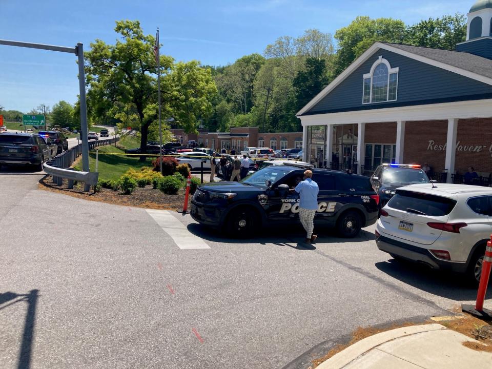 Multiple police departments were on the scene of a police-involved shooting at Rest Haven in Spring Garden Township, May 2, 2024. York City Police Commissioner Michael Muldrow is seen here talking to officers in a police vehicle.