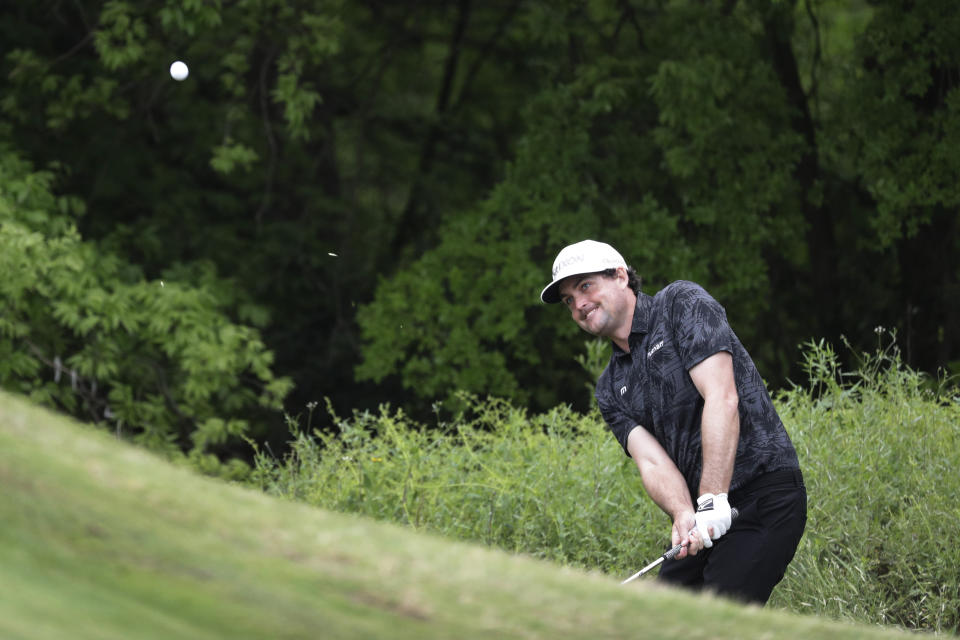 Keegan Bradley chips to the green on the first hole during round-robin play at the Dell Technologies Match Play Championship golf tournament, Friday, March 29, 2019, in Austin, Texas. (AP Photo/Eric Gay)