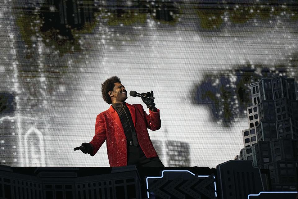 The Weeknd performs during the halftime show of the NFL Super Bowl 55 football game between the Kansas City Chiefs and Tampa Bay Buccaneers, Sunday, Feb. 7, 2021, in Tampa, Fla. (AP Photo/David J. Phillip)