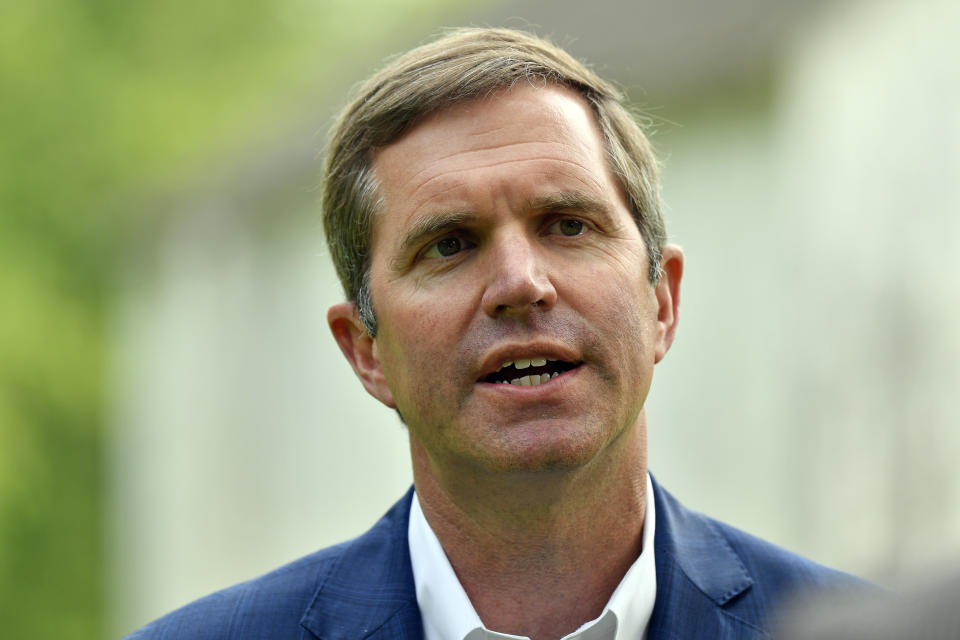 Kentucky Gov. Andy Beshear sits for an interview in Versailles, Ky., Wednesday, May 17, 2023. Beshear won the Democratic primary for governor, and will face Republican Kentucky Attorney General Daniel Cameron in the general election in Nov. (AP Photo/Timothy D. Easley)