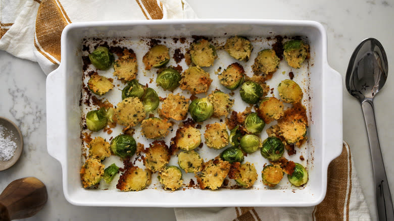 roasted parmesan crusted brussels sprouts in baking dish