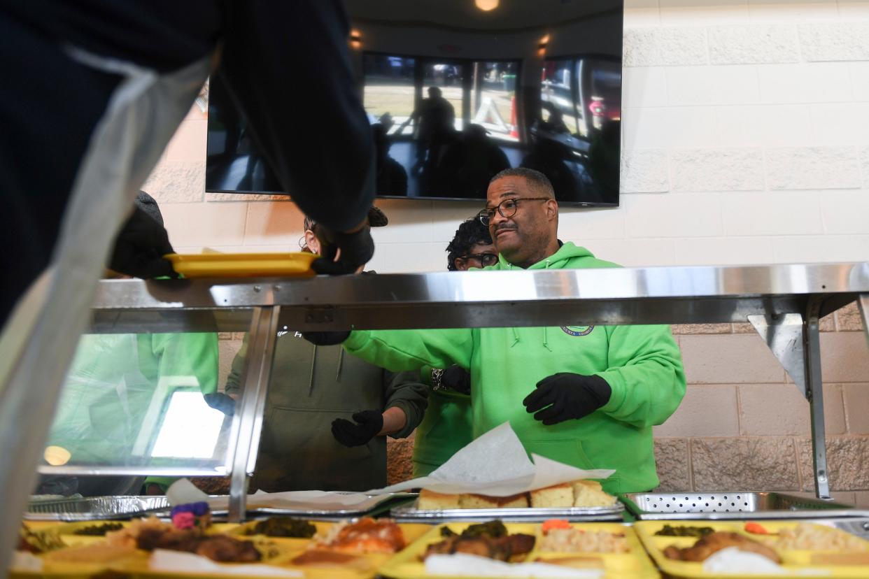 Mayor Garnett Johnson helps prepare trays of food during the second annual MLK Day of Service at The Master's Table on Monday, Jan. 15, 2024. Golden Harvest Food Bank prepared to serve about 300 lunches, in addition to medical screenings by Augusta University students, and showers through Project Refresh.