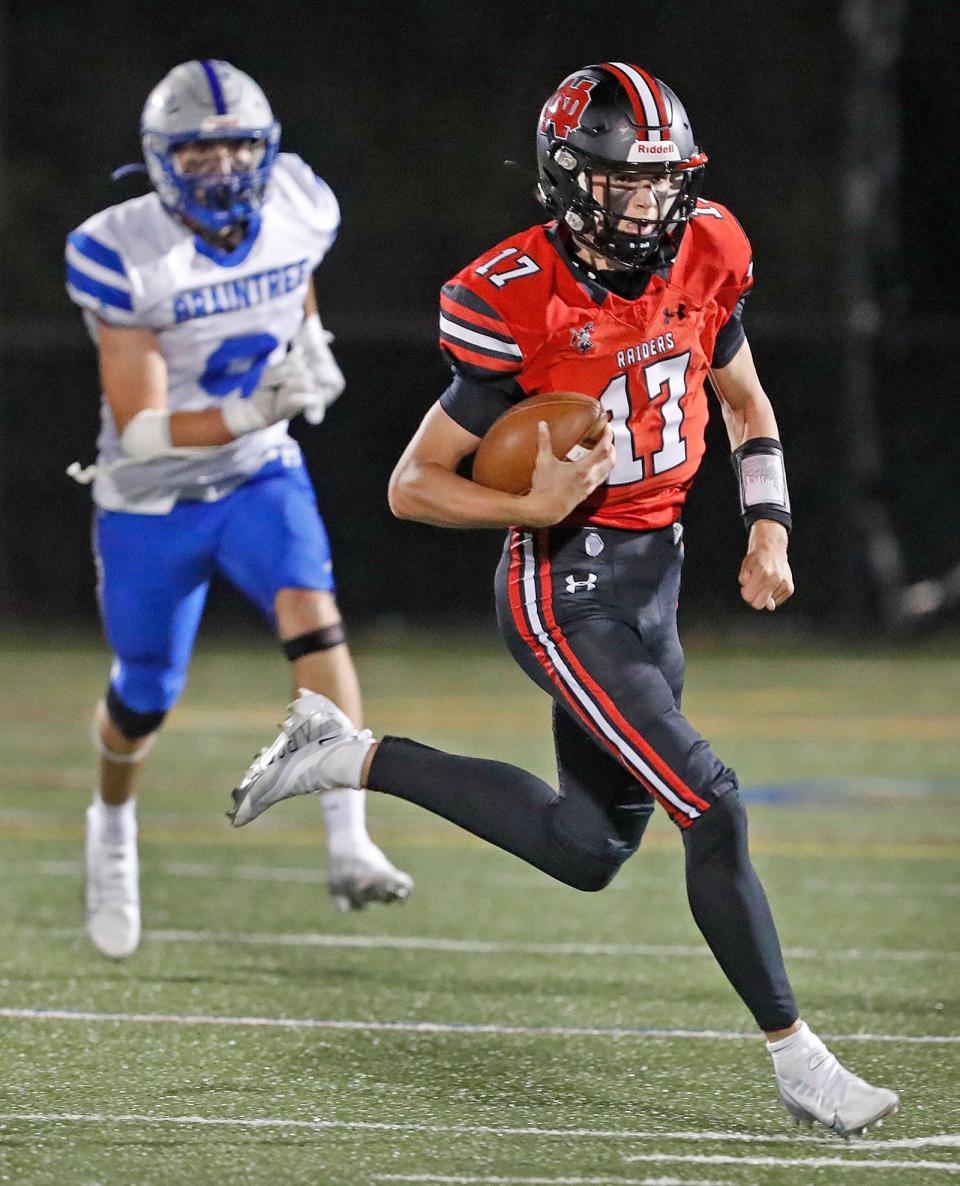 North Quincy QB Mikey Galligan runs for the first-down maker and the sidelines.

The North Quincy Raiders hosted the Braintree Wamps at Veterans Stadium in Quincy for gridiron action on Friday, Sept. 15, 2023