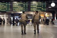 Belgian soldiers patrol in the arrival hall at Midi railway station in Brussels, November 21, 2015. REUTERS/Francois Lenoir