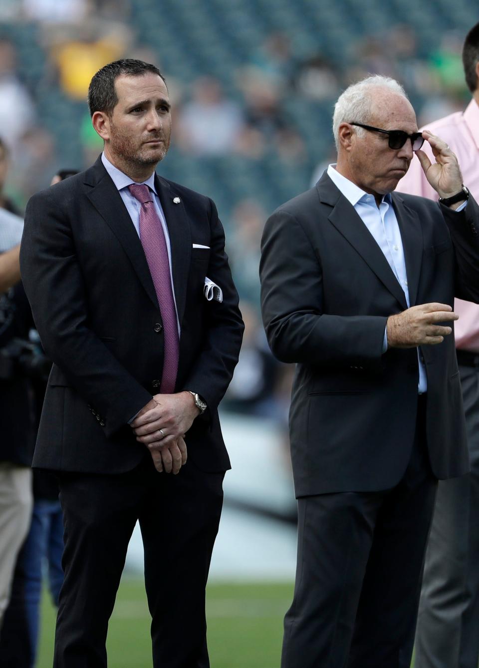 Philadelphia Eagles' Howie Roseman, left, and Jeffrey Lurie and seen during an NFL football game against the Minnesota Vikings, Sunday, Oct. 7, 2018, in Philadelphia. (AP Photo/Michael Perez)