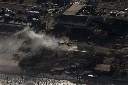 The aftermath of a boardwalk fire is seen in this aerial photograph over Seaside Park, New Jersey, September 13, 2013. REUTERS/Adrees Latif