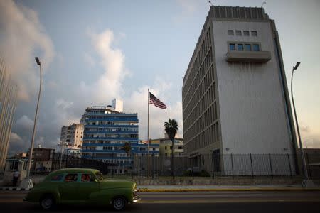 A vintage car passes by the U.S. Embassy in Havana, Cuba, September 21, 2016. REUTERS/Alexandre Meneghini