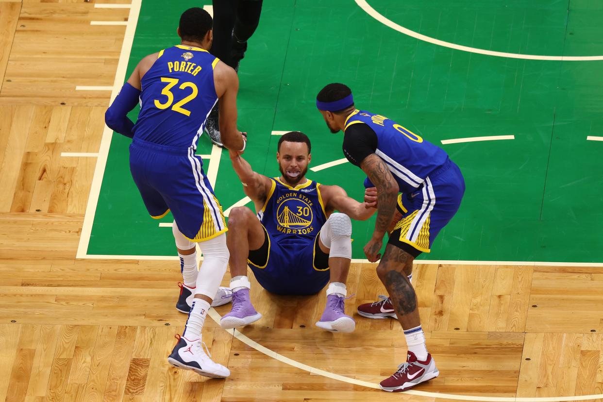 Otto Porter Jr. (32) and Gary Payton II (0) helped to uplift Stephen Curry (30) and the Warriors during their run to the title. But both will be playing elsewhere next season.