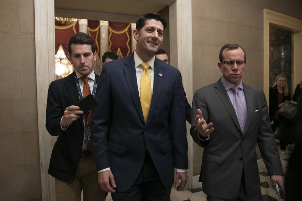 FILE - In this Dec. 20, 2018 file photo House Speaker Paul Ryan leaves the chamber after the Republican-led House approved funding for President Donald Trump's border wall at the Capitol in Washington. Ryan thinks his divided party, and history, will move on since the chaotic end of Donald Trump's presidency. The either-or debate over fealty to Trump "is going to fade," the 2012 Republican vice presidential candidate said in an interview. "I think circumstances, ideas and new candidates are going to overshadow that whole conversation." (AP Photo/J. Scott Applewhite,File)