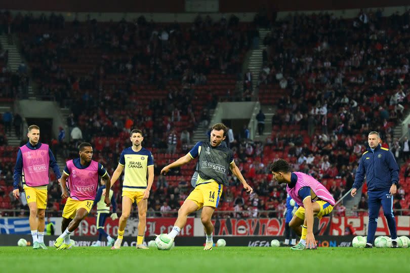 Rory Delap oversees a warm-up session at Maccabi Tel Aviv.